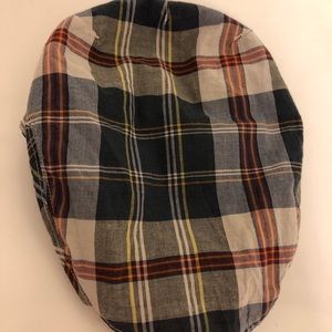 Blue plaid newsboy cap.